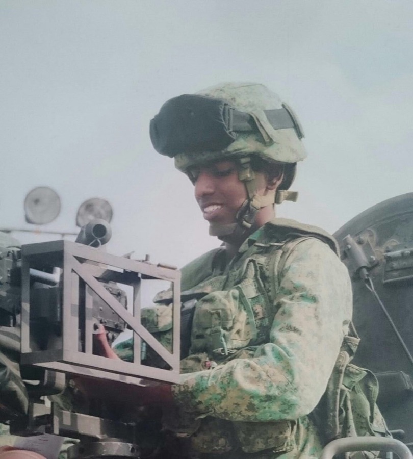 Abilash in uniform during National Service